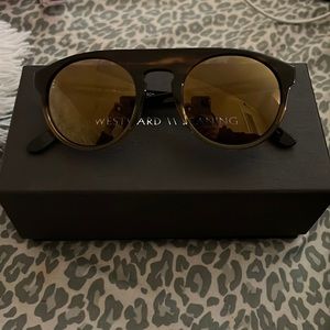 Westward leaning sunglasses!